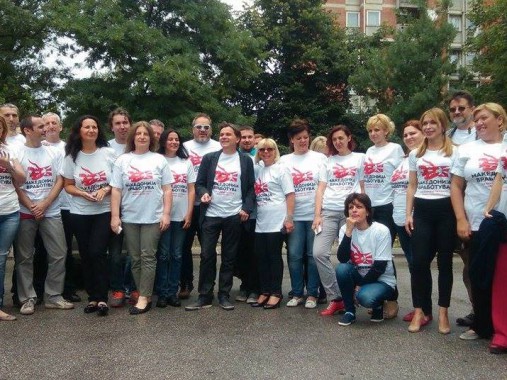 Editorial Board of Vest daily at a recent protest, wearing t-shirts from the government campaign "Macedonia Employs." Photo: Meta.mk